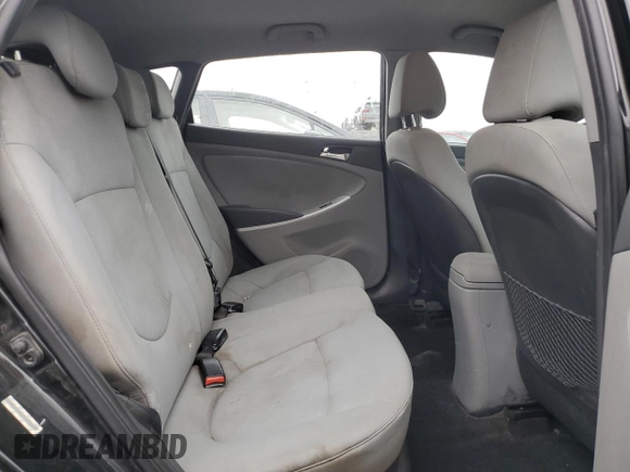 2014 Hyundai Accent SE z VIN KMHCU5AE4EU183469, wystawiony jako Copart lot #52501505 z przebiegiem 112 034 mil mil oraz Szkoda całkowita • Salvage title. Historia ofert i sprzedaży dostępna na DreamBid. Obrazek 10.