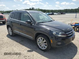 2012 Volkswagen Tiguan SEL with VIN WVGAV7AX2CW605399, listed as a Copart auction lot 55201935 with 128,527 mi miles and Clean Title. Bid and sale history available at DreamBid. Image 4.