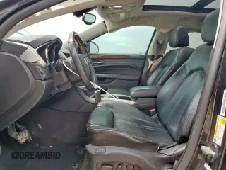 2012 Cadillac SRX Premium Collection z VIN 3GYFNCE39CS526425, wystawiony jako Copart lot #60557615 z przebiegiem 161 217 mil mil oraz Szkoda całkowita • Salvage title. Historia ofert i sprzedaży dostępna na DreamBid. Obrazek 7.