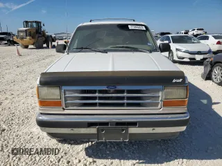 1994 Ford Explorer Eddie Bauer z VIN 1FMDU32X4RUD96419, wystawiony jako Copart lot #77066224 z przebiegiem 179 299 mil mil oraz Tytuł czysty. Historia ofert i sprzedaży dostępna na DreamBid. Obrazek 5.
