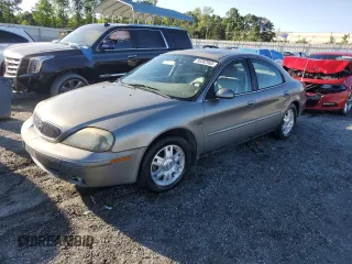 2004 Mercury Sable LS Premium with VIN 1MEHM55S84A614002, listed as a Copart auction lot 56582965 with 185,589 mi miles and Salvage title. Bid and sale history available at DreamBid. Image 1.
