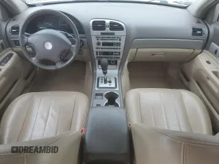 2005 Lincoln LS Sport z VIN 1LNHM87A05Y667868, wystawiony jako Copart lot #73318074 z przebiegiem 114 623 mil mil oraz Szkoda całkowita • Salvage title. Historia ofert i sprzedaży dostępna na DreamBid. Obrazek 8.