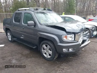 2012 Honda Ridgeline RTL z VIN 5FPYK1F53CB460143, wystawiony jako IAAI lot #41977034 z przebiegiem 161 777 mil mil oraz . Historia ofert i sprzedaży dostępna na DreamBid. Obrazek 1.