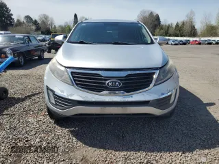 2012 Kia Sportage EX z VIN KNDPCCA26C7176313, wystawiony jako Copart lot #51994005 z przebiegiem 167 759 mil mil oraz Szkoda całkowita • Salvage title. Historia ofert i sprzedaży dostępna na DreamBid. Obrazek 5.