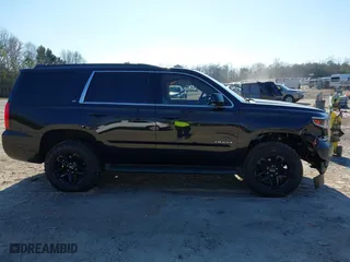 2019 Chevrolet Tahoe LT with VIN 1GNSKBKC3KR345776, listed as a IAAI auction lot 41674948 with 119,871 mi miles. Bid and sale history available at carsss.com. Image 13.