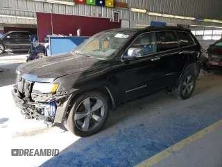 2016 Jeep Grand Cherokee Overland with VIN 1C4RJFCT0GC312261, listed as a Copart auction lot 45321475 with 104,315 mi miles and Salvage title. Bid and sale history available at DreamBid. Image 1.