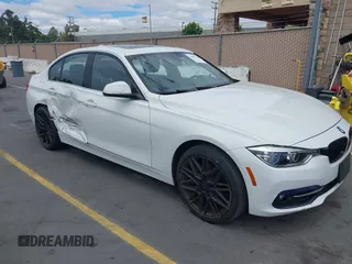 2018 BMW 3 Series 330i with VIN WBA8B9C59JK677155, listed as a IAAI auction lot 42803320 with 49,797 mi miles and . Bid and sale history available at DreamBid. Image 1.