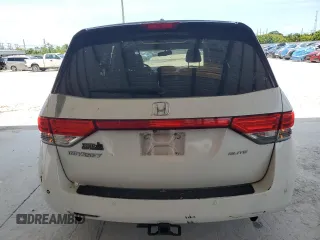 2014 Honda Odyssey Touring z VIN 5FNRL5H9XEB123330, wystawiony jako Copart lot #59023145 z przebiegiem 118 371 mil mil oraz Nie do naprawy • Non repairable. Historia ofert i sprzedaży dostępna na DreamBid. Obrazek 6.