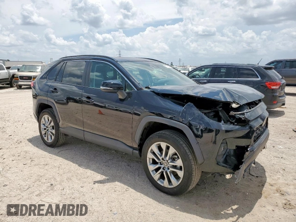 2022 Toyota RAV4 XLE Premium with VIN 2T3A1RFVXNC310217, listed as a Copart auction lot 65779855 with 31,626 mi miles and Salvage title. Bid and sale history available at DreamBid. Image 4.