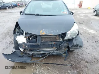 2012 Toyota Yaris L with VIN JTDKTUD30CD539341, listed as a IAAI auction lot 41981342 with 210,253 mi miles. Bid and sale history available at carsss.com. Image 6.