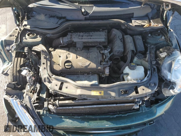 2015 MINI Convertible with VIN WMWZN3C53FT862148, listed as a Copart auction lot 76911714 with 56,065 mi miles and Salvage title. Bid and sale history available at DreamBid. Image 11.