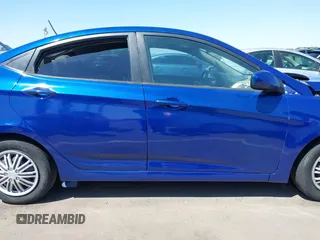 2014 Hyundai Accent GLS with VIN KMHCT4AE0EU655857, listed as a IAAI auction lot 41987827 with 172,535 mi miles. Bid and sale history available at carsss.com. Image 13.