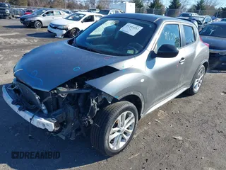 2012 Nissan Juke SV with VIN JN8AF5MV6CT116848, listed as a IAAI auction lot 41353533 with 121,513 mi miles. Bid and sale history available at carsss.com. Image 2.