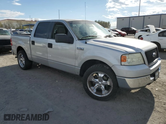 2005 Ford F-150 XLT with VIN 1FTRW12W35KC32505, listed as a Copart auction lot 54786525 with 149,614 mi miles and Salvage title. Bid and sale history available at DreamBid. Image 4.