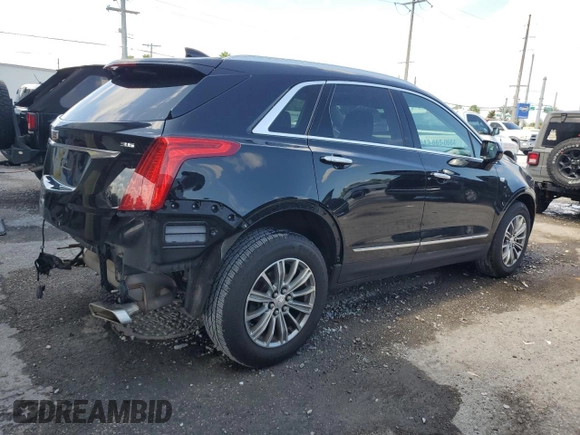 2017 Cadillac XT5 Luxury AWD with VIN 1GYKNDRS6HZ243674, listed as a Copart auction lot 59569145 with 74,550 mi miles and Salvage title. Bid and sale history available at DreamBid. Image 3.