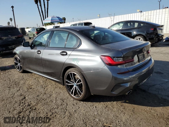 2022 BMW 3 Series 330e with VIN 3MW5P7J04N8C53017, listed as a Copart auction lot 84180844 with 17,001 mi miles and Salvage Title. Bid and sale history available at carsss.com. Image 2.