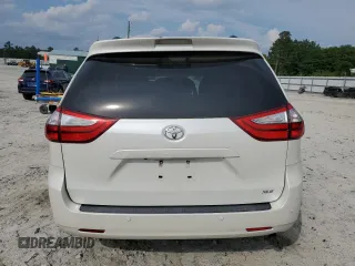 2016 Toyota Sienna XLE with VIN 5TDYK3DC3GS730639, listed as a Copart auction lot 57379935 with 105,323 mi miles and Salvage title. Bid and sale history available at DreamBid. Image 6.