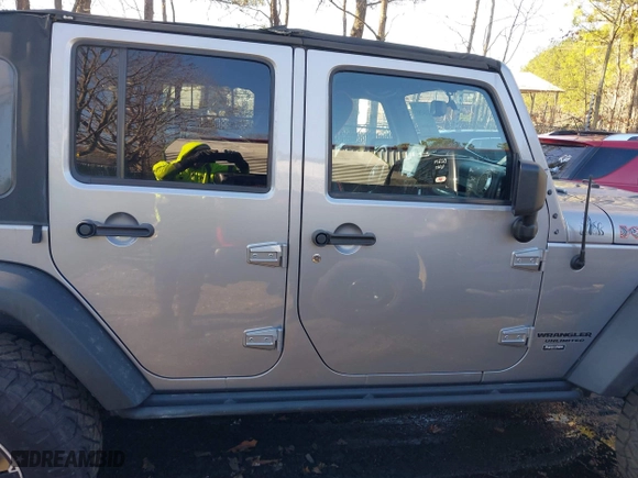 2015 Jeep Wrangler Unlimited Rubicon Hard Rock with VIN 1C4HJWFG1FL777222, listed as a IAAI auction lot 41843893 with 74,718 mi miles. Bid and sale history available at carsss.com. Image 13.