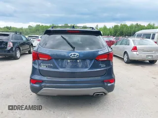 2017 Hyundai Santa Fe 2.4L z VIN 5XYZUDLB0HG418726, wystawiony jako IAAI lot #42375177 z przebiegiem 159 118 mil mil oraz . Historia ofert i sprzedaży dostępna na DreamBid. Obrazek 16.