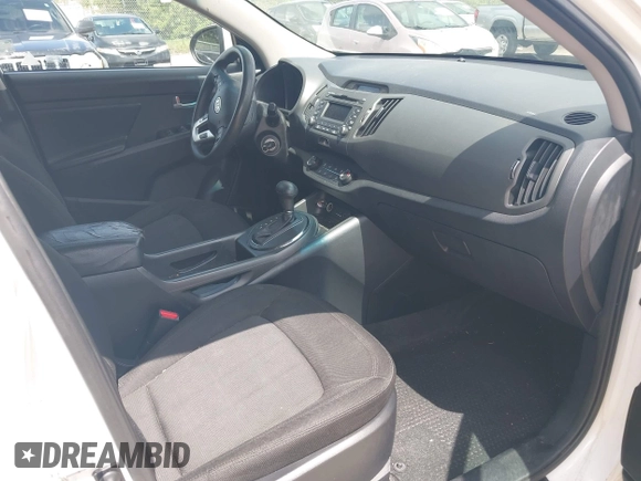 2012 Kia Sportage LX with VIN KNDPB3A2XC7237360, listed as a IAAI auction lot 42478625 with 122,824 mi miles and . Bid and sale history available at DreamBid. Image 5.