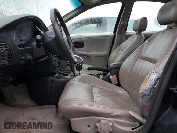 2000 Saturn SL with VIN 1G8ZK5270YZ269898, listed as a Copart auction lot 88082365 with 124,233 mi miles and Salvage title. Bid and sale history available at DreamBid. Image 7.