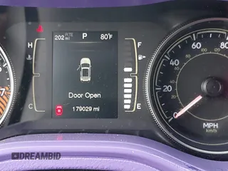 2014 Jeep Cherokee Latitude with VIN 1C4PJLCS4EW106479, listed as a IAAI auction lot 42283214 with 179,029 mi miles and . Bid and sale history available at DreamBid. Image 7.