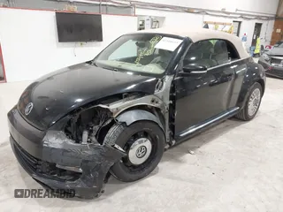 2014 Volkswagen Beetle 1.8T с VIN 3VW517AT5EM818796, выставлен на аукционе IAAI как лот 42318653 с пробегом 150 443 миль миль и . История ставок и продаж доступна на DreamBid. Изображение 6.