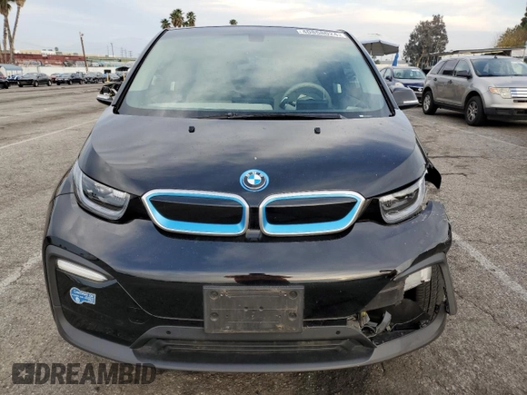 2020 BMW i3 z VIN WBY8P4C08L7G74380, wystawiony jako Copart lot #40858024 z przebiegiem 34 379 mil mil oraz . Historia ofert i sprzedaży dostępna na DreamBid. Obrazek 5.