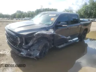 2021 Ram 1500 Lone Star with VIN 1C6RREFT5MN690744, listed as a Copart auction lot 61264865 with 69,456 mi miles and Salvage title. Bid and sale history available at DreamBid. Image 1.