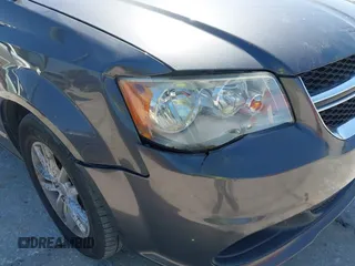 2015 Dodge Grand Caravan SXT with VIN 2C4RDGCG1FR556846, listed as a IAAI auction lot 42179172 with 120,170 mi miles and . Bid and sale history available at DreamBid. Image 6.