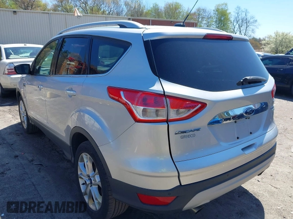 2016 Ford Escape Titanium with VIN 1FMCU9JXXGUA51537, listed as a IAAI auction lot 42118922 with 109,439 mi miles. Bid and sale history available at carsss.com. Image 3.