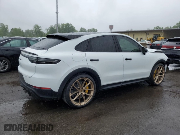 2023 Porsche Cayenne with VIN WP1BK2AY8PDA39066, listed as a Copart auction lot 60699995 with 7,785 mi miles and Salvage title. Bid and sale history available at DreamBid. Image 3.