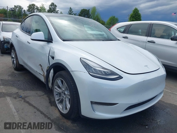 2022 Tesla Model Y Long Range z VIN 7SAYGDEE6NF419332, wystawiony jako IAAI lot #42020974 z przebiegiem 55 680 mil mil oraz . Historia ofert i sprzedaży dostępna na DreamBid. Obrazek 1.