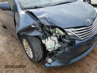 2015 Toyota Sienna XLE with VIN 5TDYK3DC1FS594123, listed as a IAAI auction lot 41944711 with 208,249 mi miles. Bid and sale history available at carsss.com. Image 6.