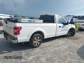 2019 Ford F-150 XL with VIN 1FTMF1CB3KKD35652, listed as a IAAI auction lot 42463370 with 96,129 mi miles and . Bid and sale history available at DreamBid. Image 4.