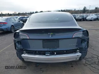 2018 Tesla Model 3 Long Range Battery with VIN 5YJ3E1EB9JF097118, listed as a IAAI auction lot 41619510 with 64,132 mi miles and . Bid and sale history available at DreamBid. Image 17.