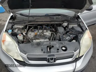 2009 Honda CR-V LX с VIN 5J6RE48329L020917, выставлен на аукционе Copart как лот 61266295 с пробегом 128 560 миль миль и Списание • Salvage title. История ставок и продаж доступна на DreamBid. Изображение 11.