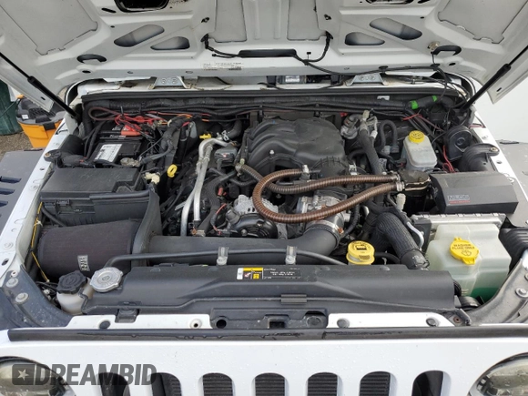 2018 Jeep Wrangler JK Unlimited Sport S with VIN 1C4BJWDG4JL814586, listed as a Copart auction lot 78290194 with 73,125 mi miles and Salvage Title. Bid and sale history available at carsss.com. Image 12.