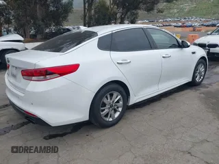 2018 Kia Optima LX with VIN 5XXGT4L3XJG215632, listed as a IAAI auction lot 41785035 with 94,854 mi miles and . Bid and sale history available at DreamBid. Image 4.