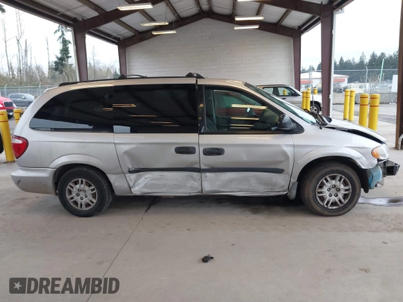 2005 Dodge Caravan SE with VIN 1D4GP24R85B351591, listed as a IAAI auction lot 41949337 with 130,821 mi miles and . Bid and sale history available at DreamBid. Image 14.