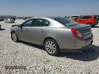 2016 Lincoln MKS z VIN 1LNHL9DK8GG600661, wystawiony jako Copart lot #49648655 z przebiegiem 56 655 mil mil oraz Szkoda całkowita • Salvage title. Historia ofert i sprzedaży dostępna na DreamBid. Obrazek 2.