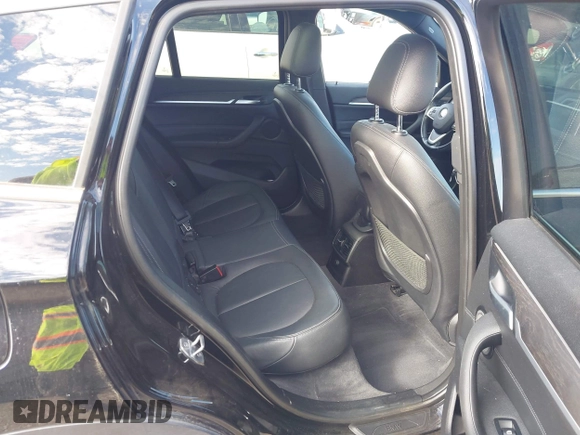 2016 BMW X1 xDrive28i with VIN WBXHT3Z3XG4A48557, listed as a IAAI auction lot 41387960 with 84,821 mi miles. Bid and sale history available at carsss.com. Image 8.