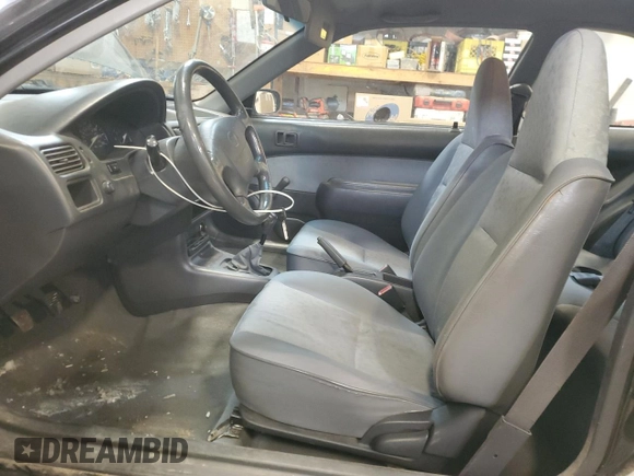 1999 Toyota Tercel z VIN JT2AC53LXX0390154, wystawiony jako Copart lot #83014424 z przebiegiem 182 579 mil mil oraz Szkoda całkowita • Salvage title. Historia ofert i sprzedaży dostępna na DreamBid. Obrazek 7.