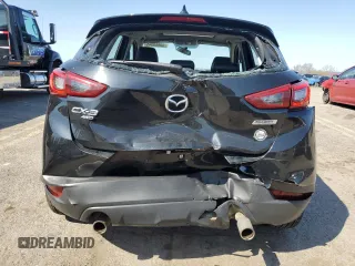 2016 Mazda CX-3 Grand Touring z VIN JM1DKBD79G0124504, wystawiony jako Copart lot #53663945 z przebiegiem 94 253 mil mil oraz Szkoda całkowita • Salvage title. Historia ofert i sprzedaży dostępna na DreamBid. Obrazek 6.