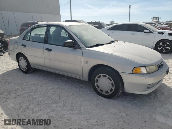2001 Mitsubishi Mirage ES z VIN JA3AY26CX1U030593, wystawiony jako Copart lot #83749264 z przebiegiem 107 641 mil mil oraz Szkoda całkowita • Salvage title. Historia ofert i sprzedaży dostępna na DreamBid. Obrazek 4.
