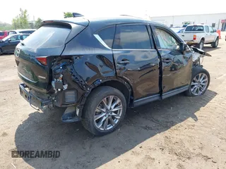 2020 Mazda CX-5 Grand Touring с VIN JM3KFADM2L0731972, выставлен на аукционе IAAI как лот 42686202 с пробегом Не указан миль и . История ставок и продаж доступна на DreamBid. Изображение 4.