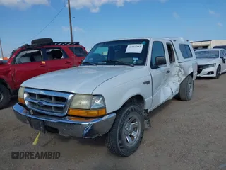 2000 Ford Ranger XL with VIN 1FTYR14V5YTA27015, listed as a IAAI auction lot 40703797 with 212,894 mi miles. Bid and sale history available at carsss.com. Image 2.