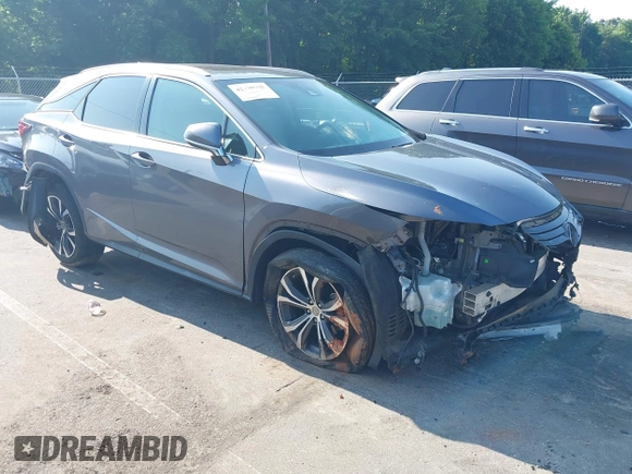 2017 Lexus RX 350 with VIN 2T2BZMCA4HC074707, listed as a IAAI auction lot 42439938 with 127,240 mi miles and . Bid and sale history available at DreamBid. Image 1.