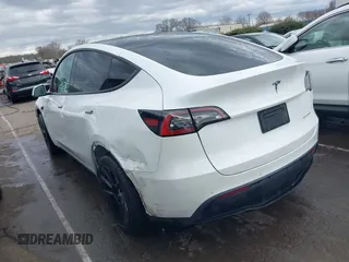 2022 Tesla Model Y Long Range with VIN 7SAYGDEE6NF461788, listed as a IAAI auction lot 41697064 with 34,034 mi miles and . Bid and sale history available at carsss.com. Image 3.
