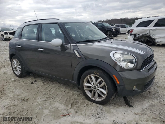 2014 MINI Cooper Countryman S with VIN WMWZC3C53EWT00673, listed as a Copart auction lot 44454065 with 76,561 mi miles and Salvage Title. Bid and sale history available at carsss.com. Image 4.